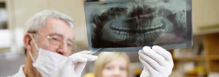 Dentist Holding X-Ray