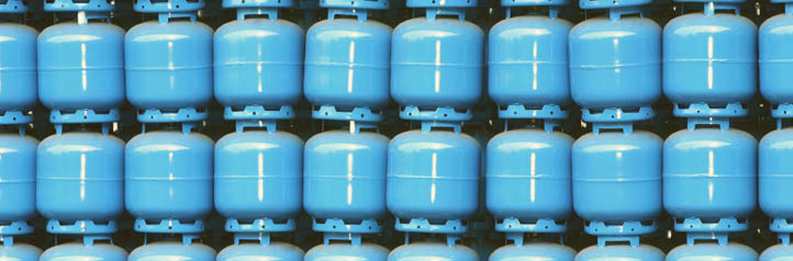 Stack of blue propane tanks