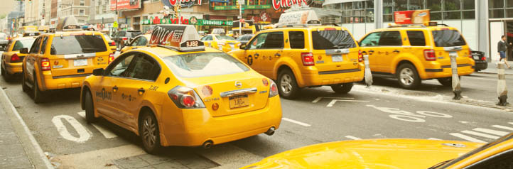 Group of yellow taxi cabs in NYC