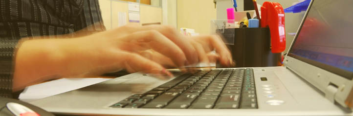 Receptionist answering an email