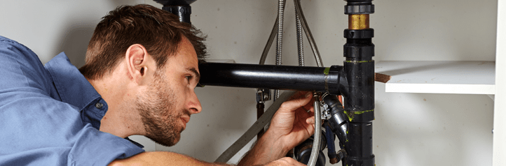 Plumber Working on Sink