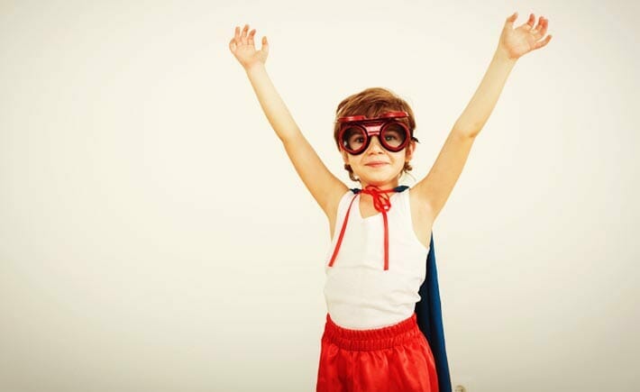 Boy in superhero costume