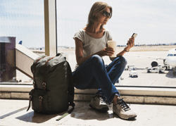 Woman In Airport On Phone