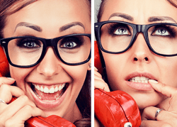 Woman Talking On Red Phone